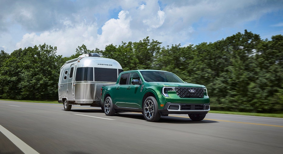 A 2025 Ford Maverick Lariat towing a trailer