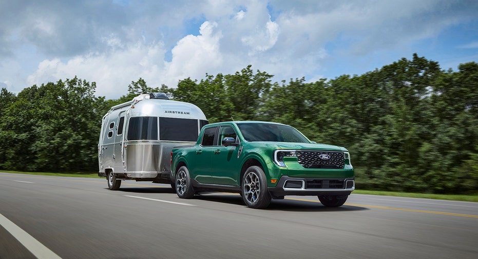 A 2025 Ford Maverick Lariat towing a trailer
