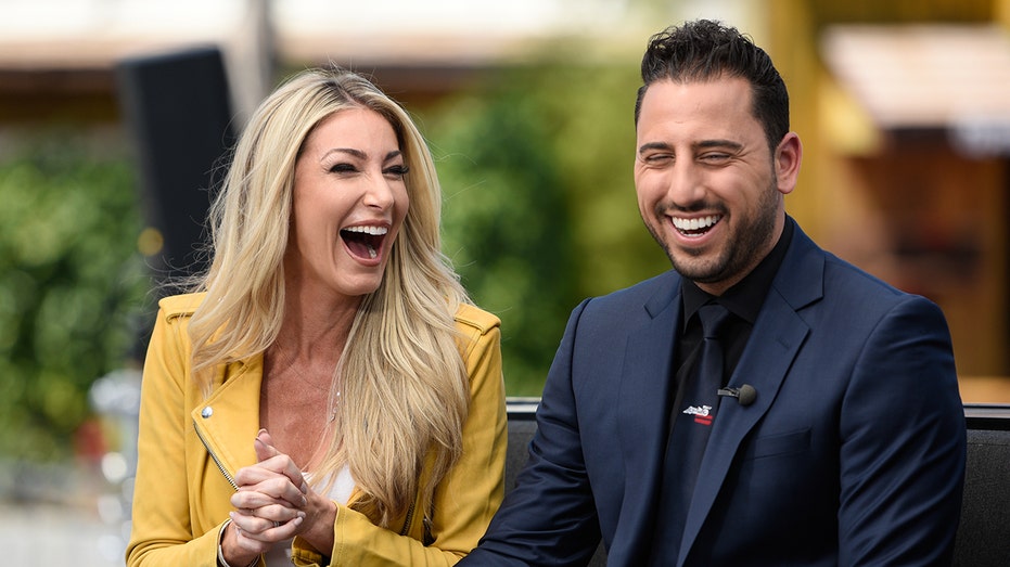 Josh Altman and Heather Altman laughing together