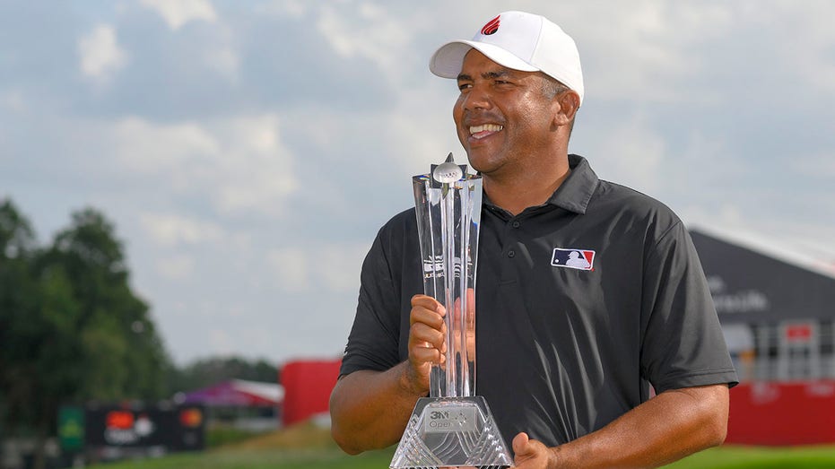 Jhonattan Vegas holds the trophy