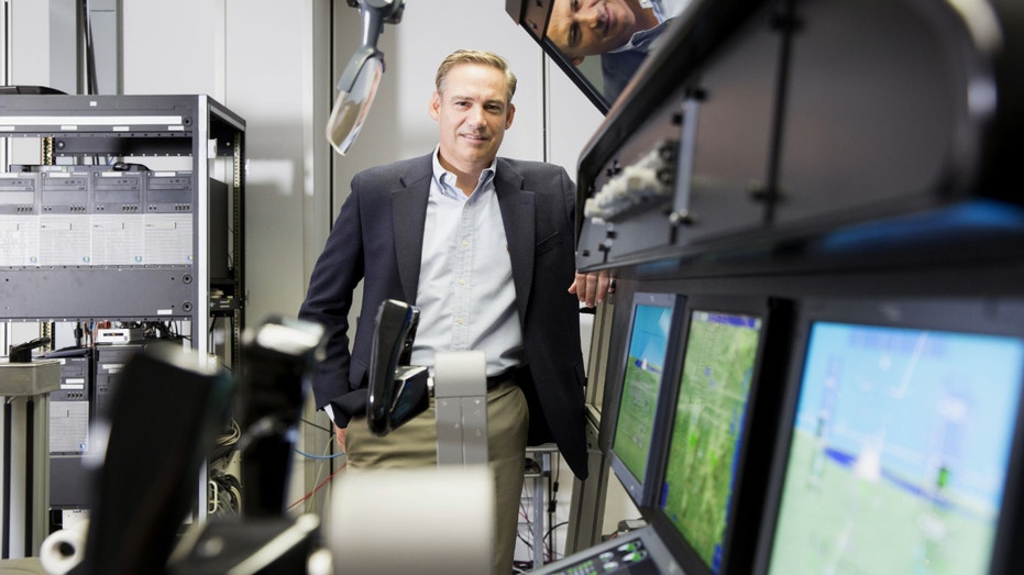 Kelly Ortberg stands for a photograph at the Rockwell Collins production facility in Manchester, Iowa, on Aug. 31, 2016.