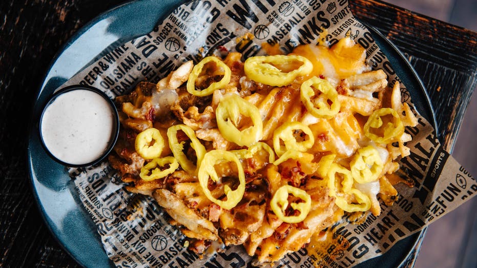 These are Walk-On's Sports Bistreaux's classic waffle cheese fries.