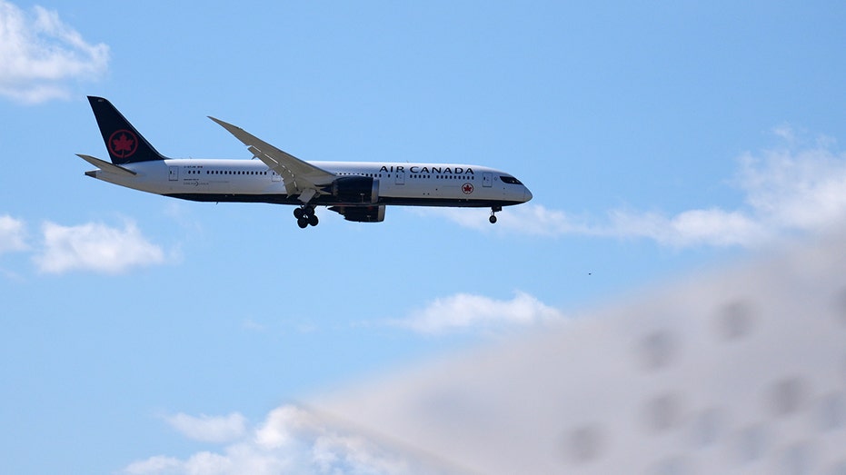 Air Canada plane in sky