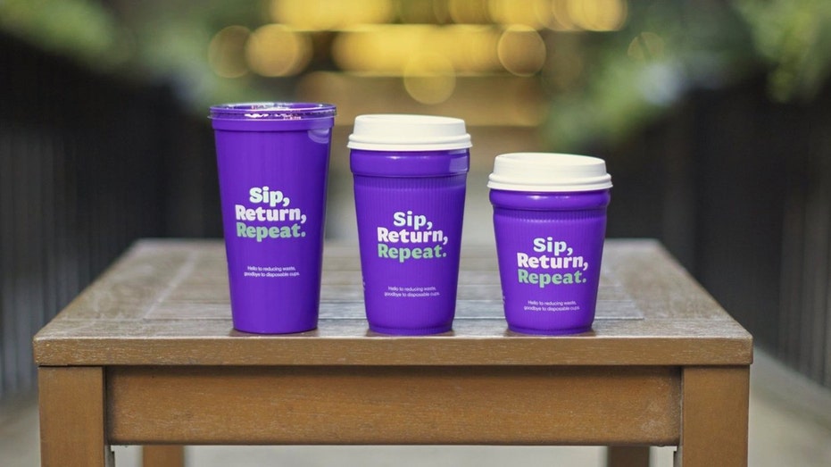 Hot cups next to cold reusable cup