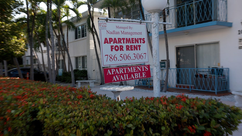 "Apartments for rent" sign