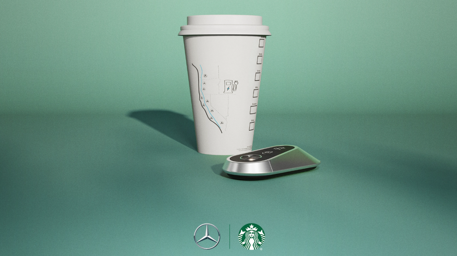 Mercedes key fob next to Starbucks cup