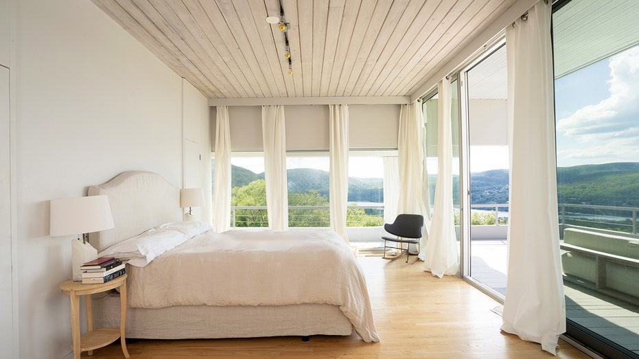 The primary bedroom features a walk-in closet, ensuite bathroom and access to the terrace.