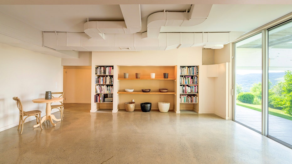 An empty room with bookshelves