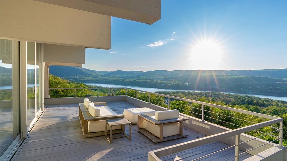 The newly built wrap-around deck provides stunning views of the sunrise and sunset.