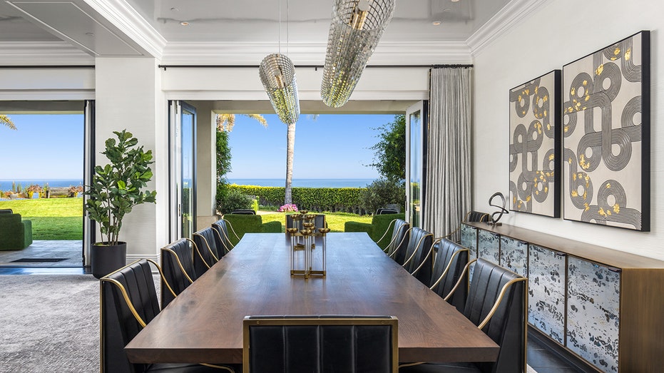 The dining room boasts a large table fit for entertaining.