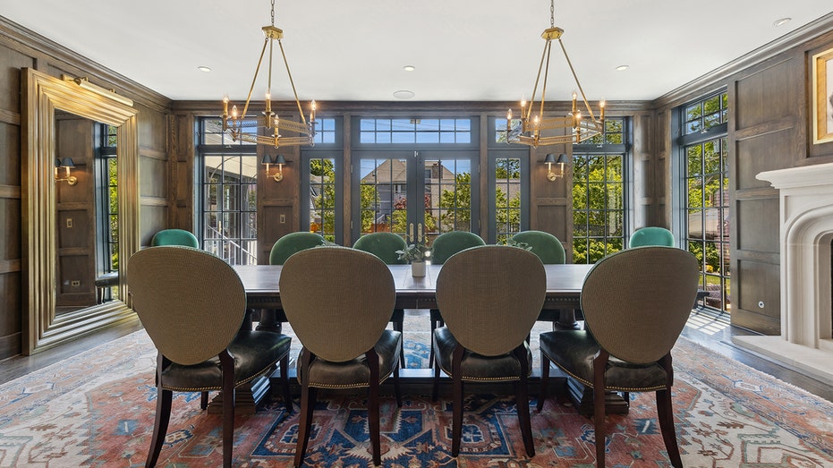 Dining room featuring table and large windows