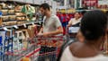 Customers look over food items displayed on August 16, 2024 at the Costco branch in Colchester, Vermont. - Fox News