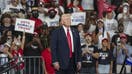 ATLANTA, GA - AUGUST 3- Former President and current Republican presidential nominee Donald Trump stands on the stage before speaking as supporters cheer during a campaign event on Saturday, August 3, 2024 in Atlanta, GA. 