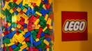 LEGO bricks are displayed next to a LEGO logo at a shop in the hotel LEGOLAND on November 29, 2022, in Billund, Denmark.