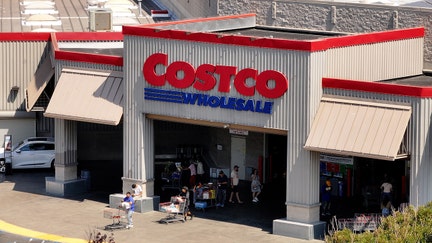 In an aerial view, the Costco logo is displayed on the exterior of a Costco store on July 11, 2024 in Richmond, California.