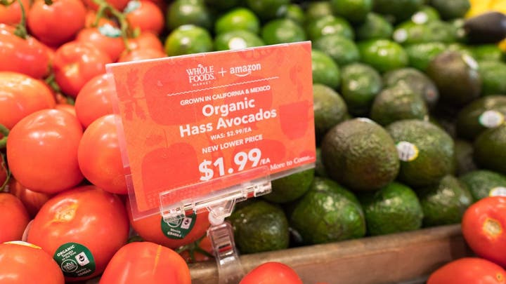 Tomatoes⁤ and avocados at Whole Foods Market
