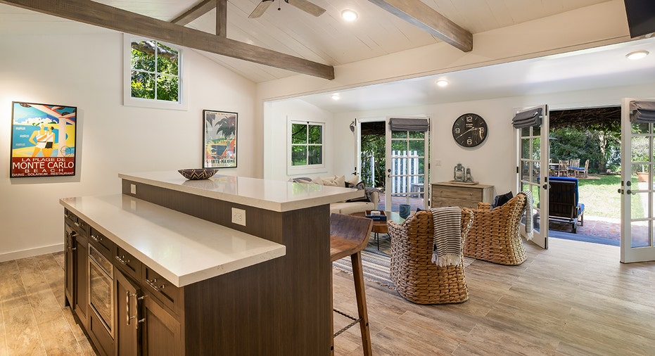 Look at the pool house kitchen and living space