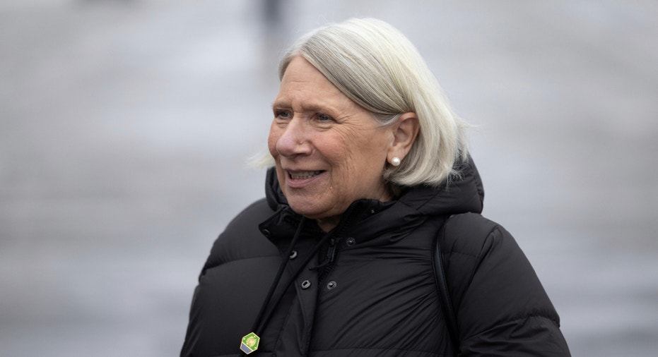 Anita Dunn, senior adviser to President Biden, stands outside Air Force One at Duluth International Airport in Duluth, Minnesota, on Jan. 25, 2024.