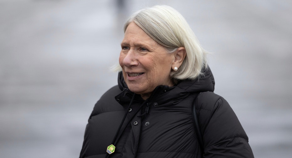 Anita Dunn, senior adviser to President Biden, stands outside Air Force One at Duluth International Airport in Duluth, Minnesota, on Jan. 25, 2024.