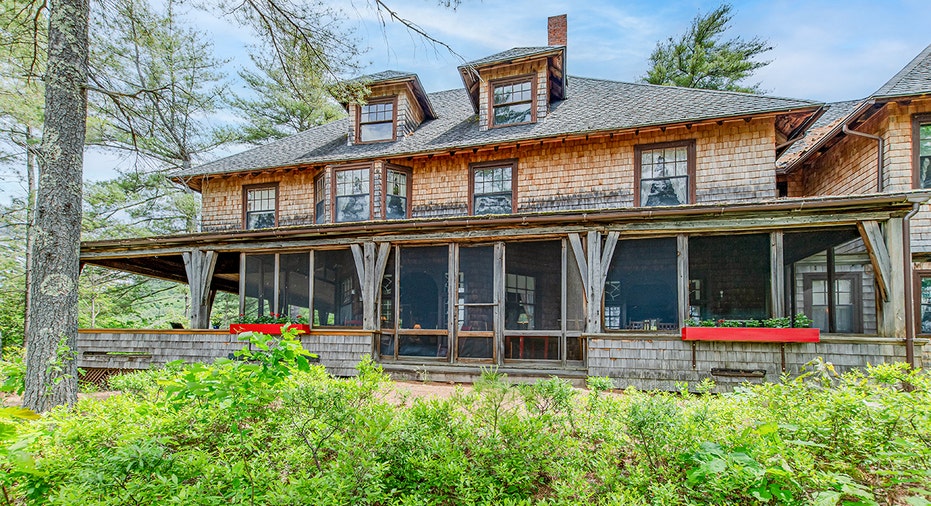 The home features a wraparound porch