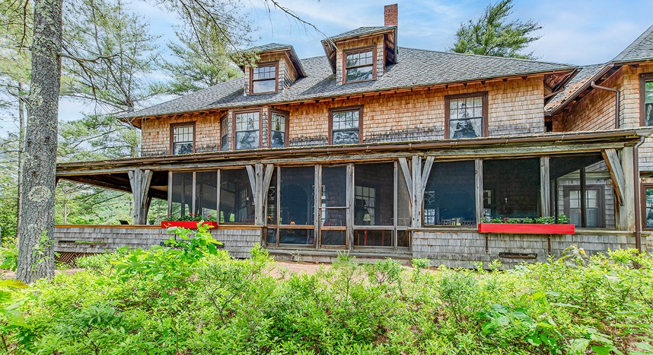 The home features a wraparound porch