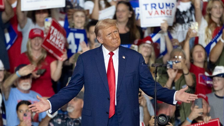 Trump gesticulates at a rally