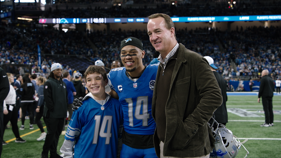 Amon-Ra St. Brown with Peyton Manning