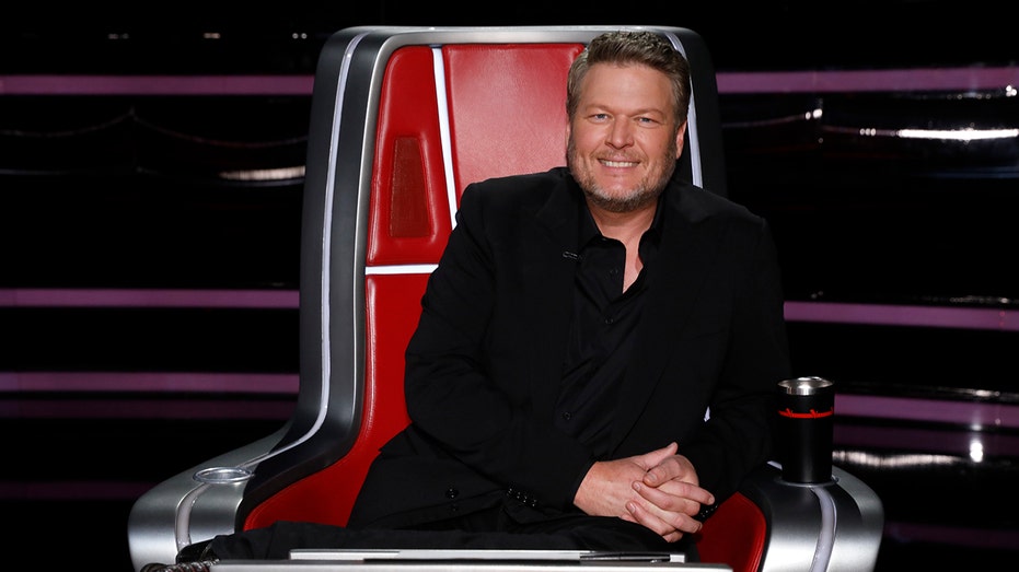 Blake Shelton sitting in "The Voice" chair