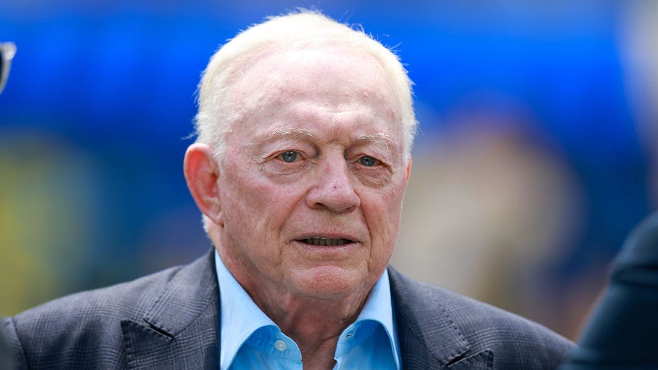 Jerry Jones looks on