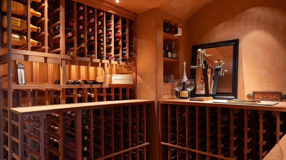 A wine cellar with many bottles of wine.