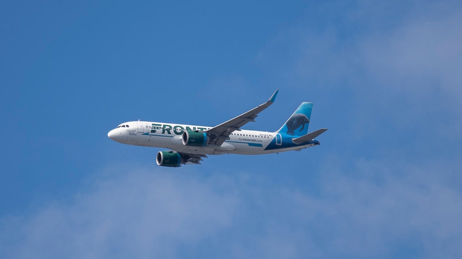 A Frontier Airlines flight over Chicago