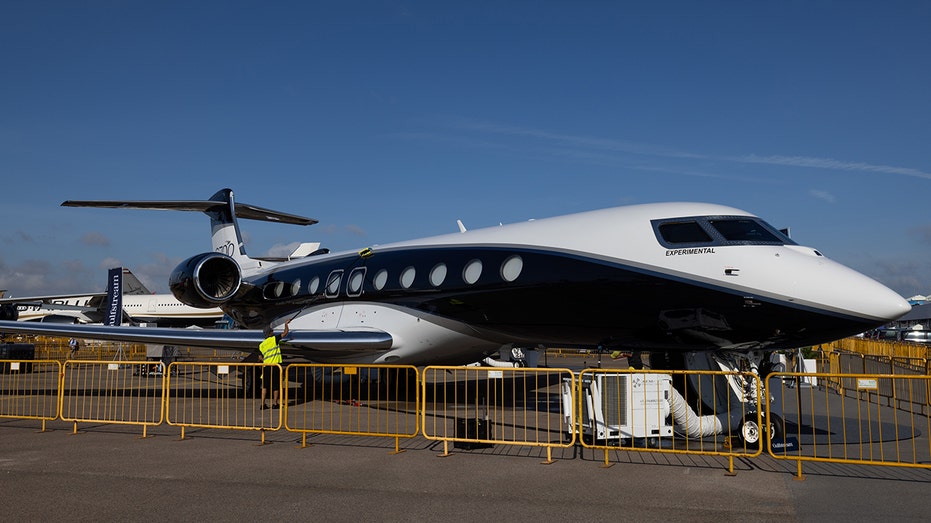 A GulfStream Aerospace Corp. G700 business jet during the Singapore Airshow in Singapore, on Tuesday, Feb. 20, 2024. Aircraft delivery delays, the uphill battle of going green by 2050 and elevated airfares that increasingly make flying the domain of the wealthy — all these topics and more will be in focus this week as executives from over 1,000 companies descend on Singapore for Asias most influential aerospace and defense exhibition. Photographer: SeongJoon Cho/Bloomberg via Getty Images