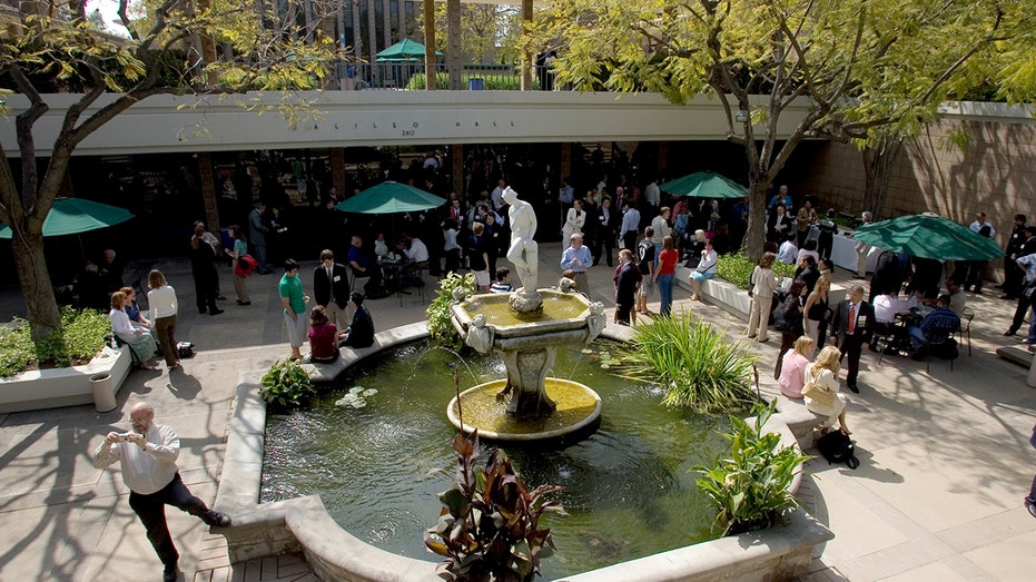 Students and others gather at Beckman Hall on the grounds of the Harvey Mudd College Campus in Pomona. (Photo by Ted Soqui/Corbis via Getty Images)