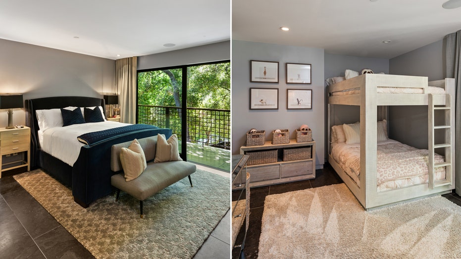 A bedroom with gray walls and blue bedding split with a bedroom with bunk beds.