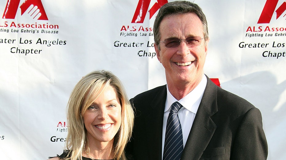 Michael Crichton and Sherri Alexander on the red carpet.