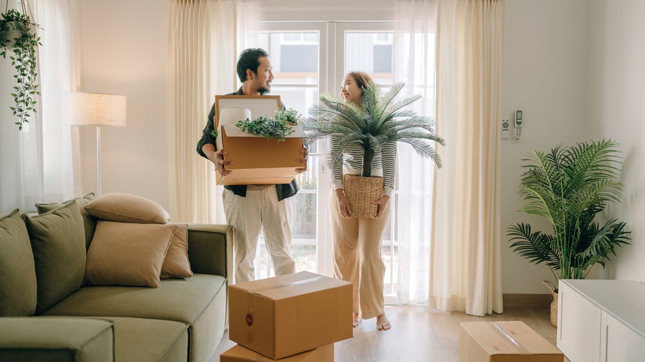 A couple moving into an apartment