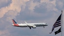 An American Airlines commercial aircraft flies over Washington as it approaches Dulles International Airport on August 5, 2024. - Fox Business News