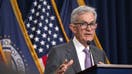 US Federal Reserve Chairman Jerome Powell speaks during a news conference after a Federal Open Market Committee meeting at the Federal Reserve in Washington, DC, on July 31, 2024. The US Federal Reserve left its key lending rate unchanged again on July 31 and said it had made &quot;some further progress&quot; in its inflation fight. Policymakers voted unanimously to maintain the US central banks benchmark interest rate between 5.25 percent and 5.50 percent, the Fed announced in a statement, adding it was &quot;attentive to the risks to both sides of its dual mandate.&quot; (Photo by ROBERTO SCHMIDT / AFP) 