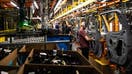 Workers assemble vehicle doors at the General Motors assembly plant in Fort Wayne, Indiana, US, on Tuesday, April 9, 2024. General Motors Co. is scheduled to release earnings figures on April 23. 