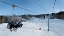 Snowboarders ride the ski lift in Beaver Creek, Colorado, U.S., on Thursday, Dec. 8, 2011. The Beaver Creek ski area operates on National Forest System lands under a special use 30-year permit from the White River National Forest. Photographer: George Frey/Bloomberg via Getty Images 