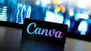  In this photo illustration, the Canva logo is displayed on a smartphone screen. 