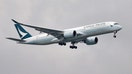 A Cathay Pacific Airways Airbus A350-900 airplane approaches to land at Changi International Airport in Singapore June 10, 2018.