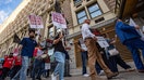 US hotel workers demonstrate as they strike over the Labor Day holiday weekend outside of the Boston Park Plaza Hotel in Boston, Massachusetts, on September 2, 2024. As many as 10,000 hotel workers were on strike across the United States on September 1, 2024, at the height of a long holiday weekend in which millions of Americans were expected to travel. Strikes were launched at 25 hotels in eight cities including Boston, San Francisco and Honolulu, as workers demand improved pay and a return to pre-Coronavirus staffing levels. (Photo by Joseph Prezioso / AFP) (Photo by JOSEPH PREZIOSO/AFP via Getty Images)
