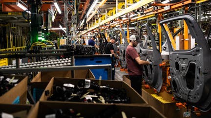 Workers assemble vehicle doors at the General Motors assembly plant in Fort Wayne, Indiana, US, on Tuesday, April 9, 2024. General Motors Co. is scheduled to release earnings figures on April 23. 