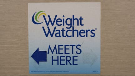 A sign for Weight Watchers is displayed at office in lower Manhattan, New York October 19, 2015.