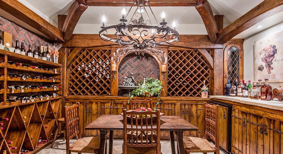 a wine cellar with a table for testing