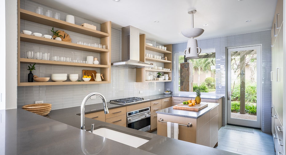 The beachfront home features two kitchens