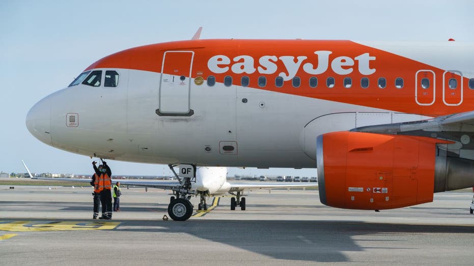 An EasyJet plane gets ready for takeoff