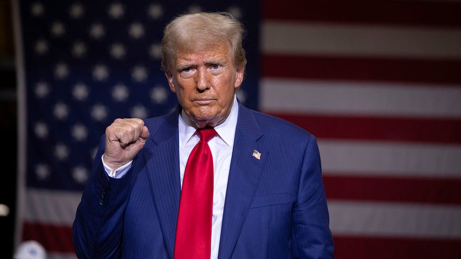 Trump pumps his fist at Michigan Rally