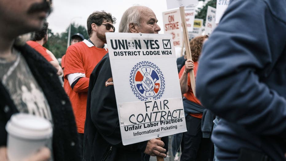 striking Boeing workers on picket line